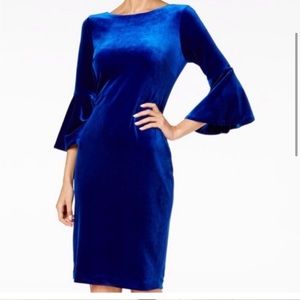 Calvin Klein Blue Velvet Bell Sleeve Dress. Zipper closure with stretch.
